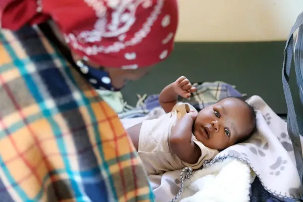 pediatric checkup for a six-week-old baby at PIH-supported Nkau Health Center
