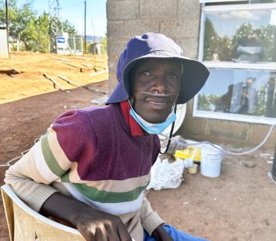 Kaizer Mahapa outside of his home in Lesotho.